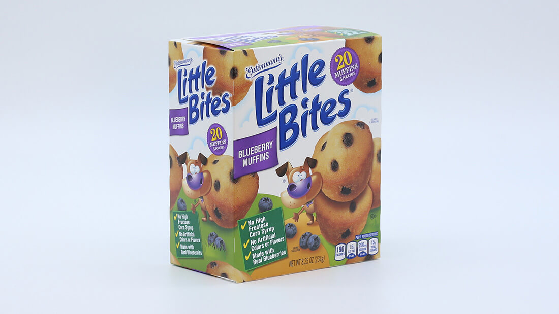 A product shot of mini muffins in a carton formed by a Delkor machine