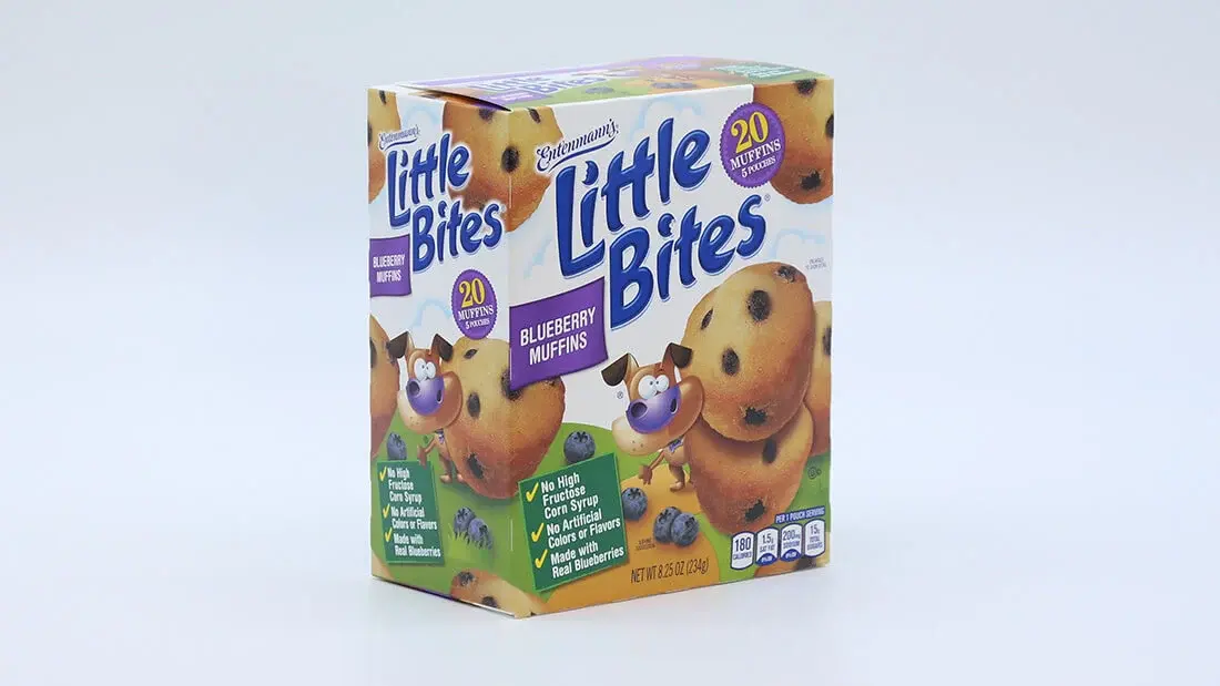 A product shot of mini muffins in a carton formed by a Delkor machine