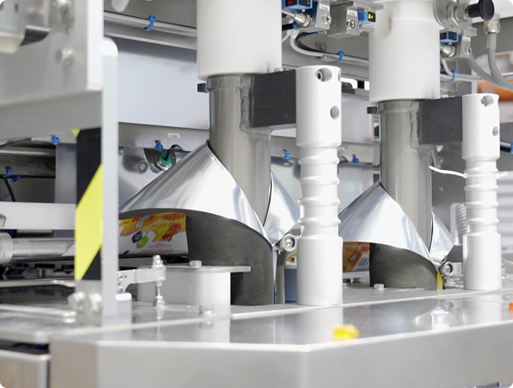 An image of film running through a TwinTube bagger machine