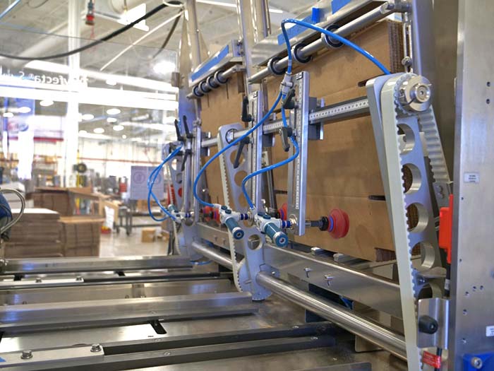 cartoning equipment laying flat blanks