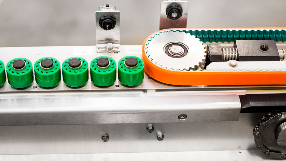 Case sealer Capstone F is outfitted with self tensioning belts for easier maintenance