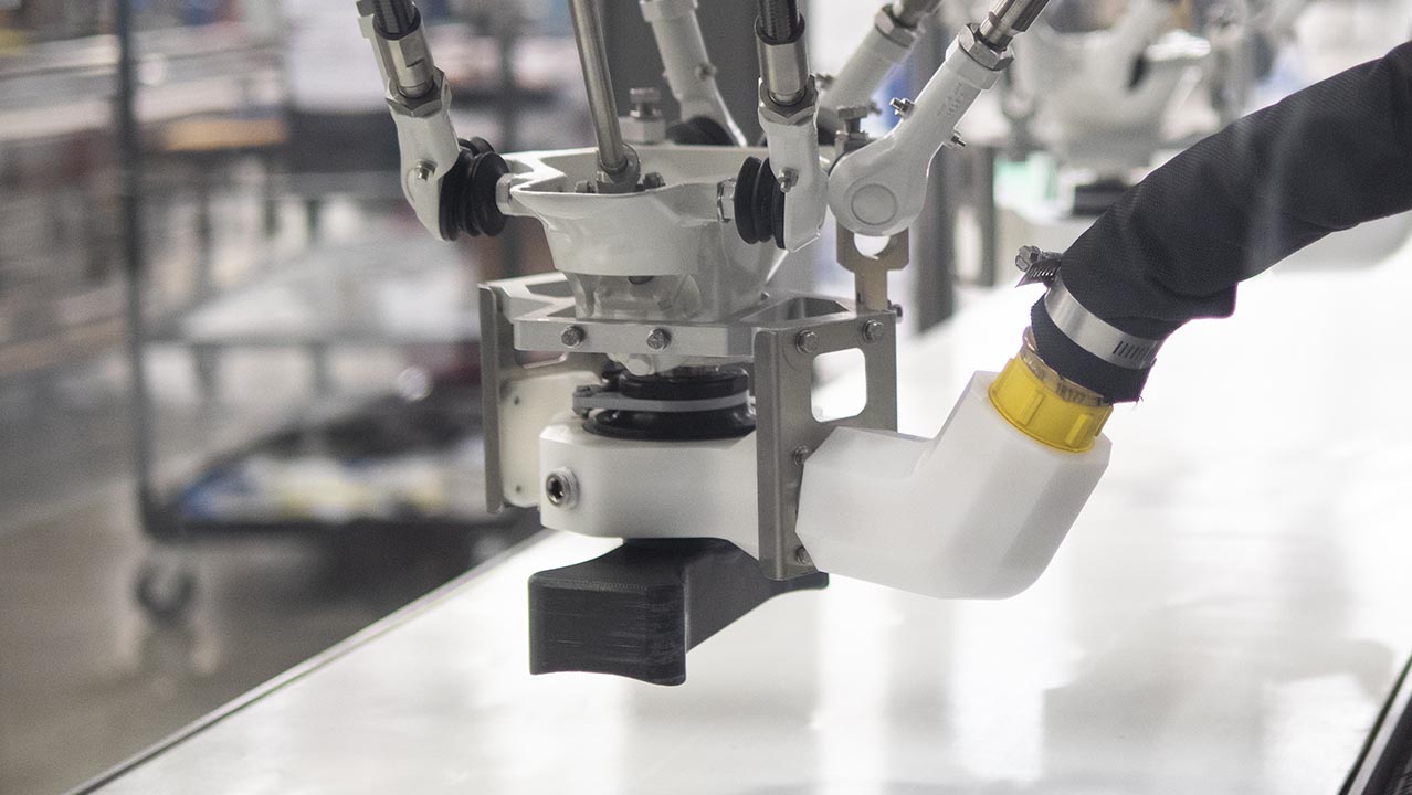 Top load cartoner 3D printed tooling head Top load cartoner 3D printed tooling head