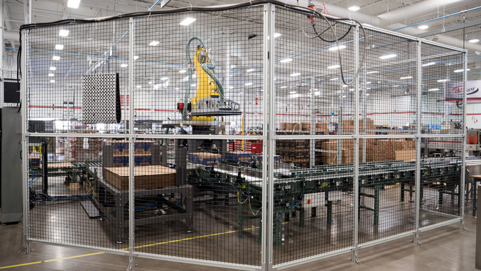 Palletizer inside of cage