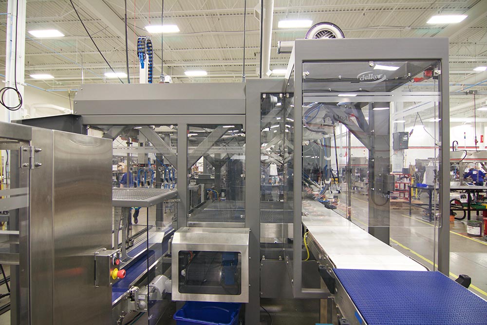 Robotic case packer infeed view