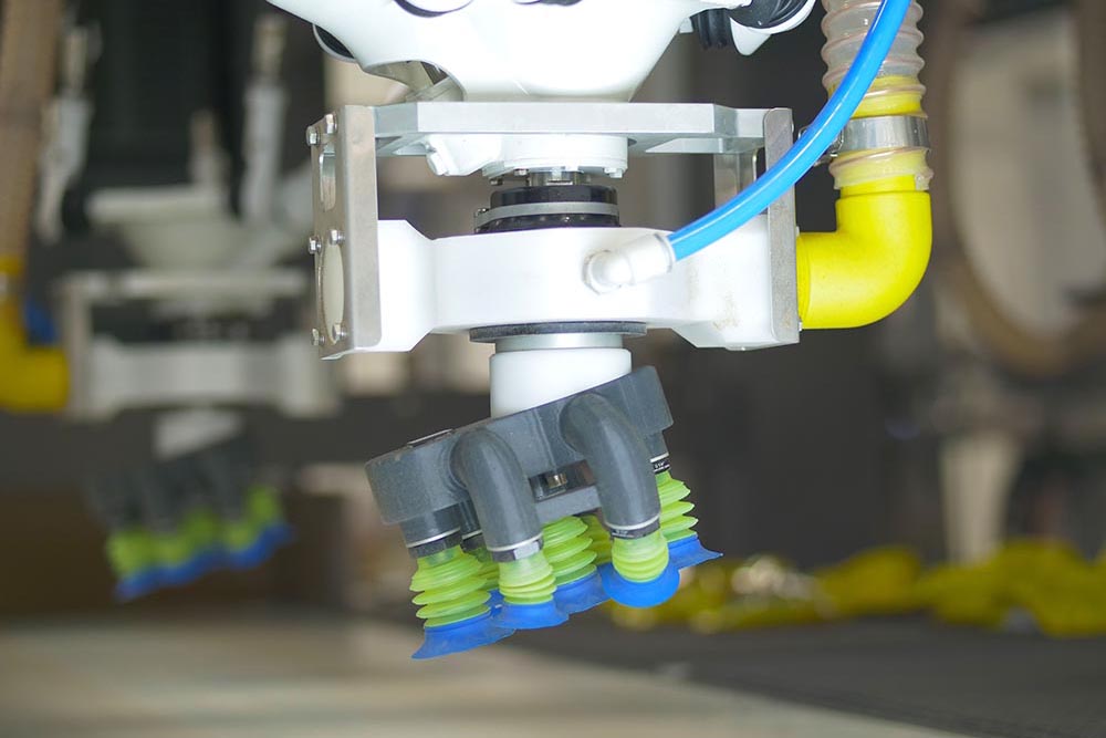Robotic pick up head with optional head design