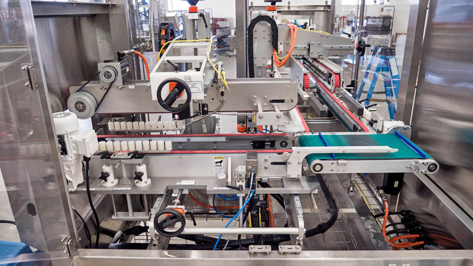 Sealing machine with tool-less changeover capabilities