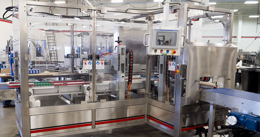 Sealing machine that can be designed left, right or inline discharge. Sealing machine that can be designed left, right or inline discharge.